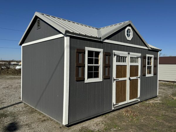 Custom Carriage House with Eclipse Dormer, Double Barn Doors, 2x3 Windows, Storage Lofts, Metal Roof, Decorative Shutters